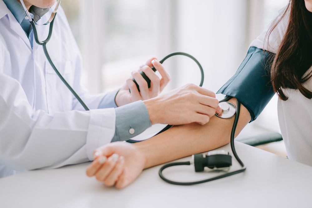 doctor using checking heart rate with stethoscope